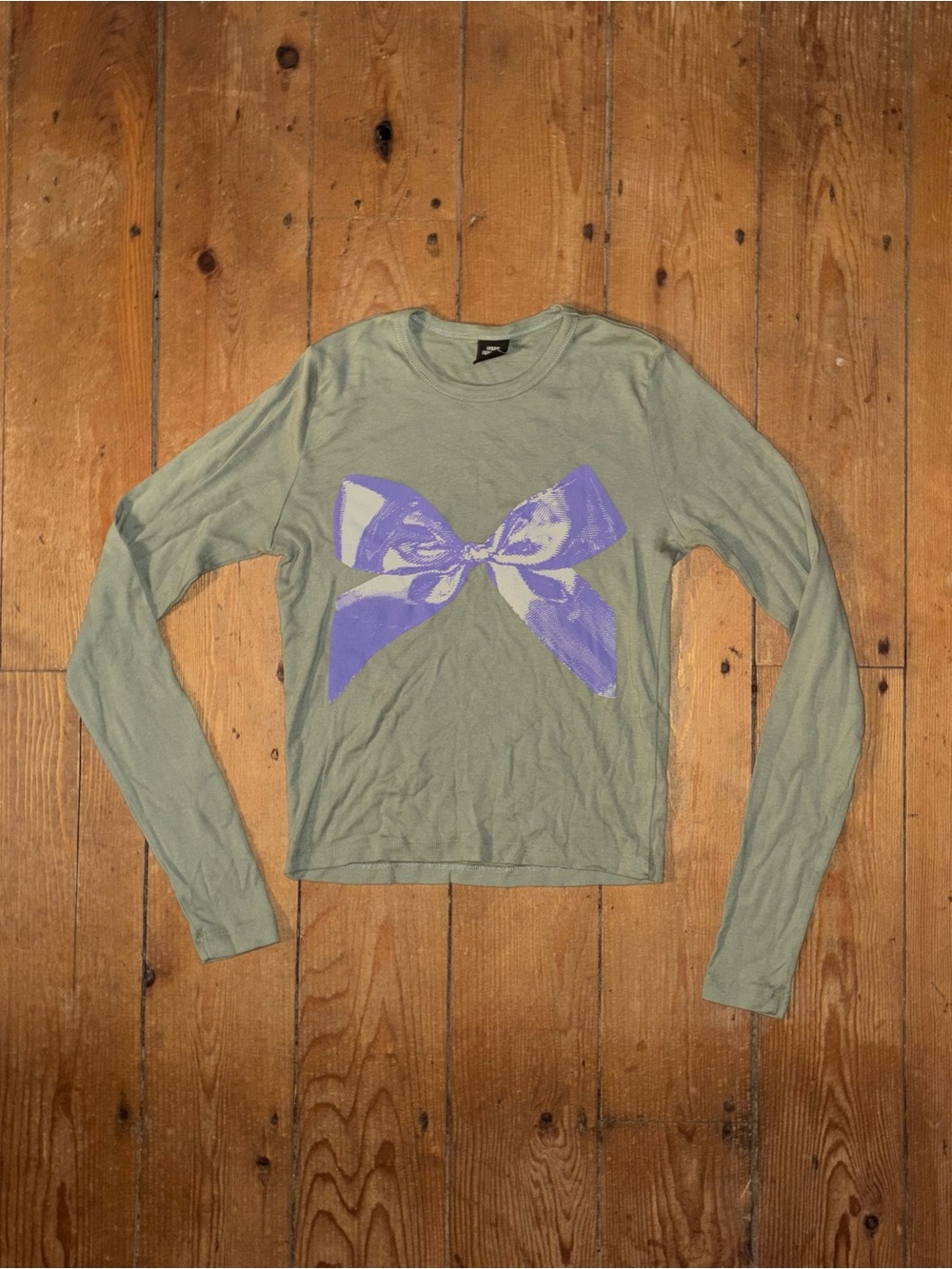 Urban Outfitters Long-Sleeve Green Shirt with Purple Bow Graphic